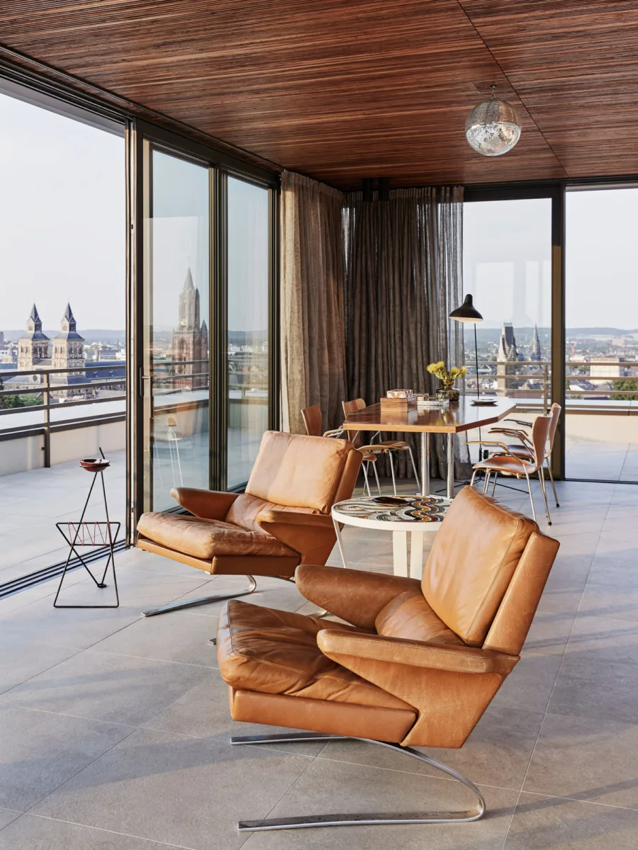 Still interior image of stunning brutalist concrete loft in Maastricht Holland designed by Nicemakers, as featured in Elle Decor Spain by renowned photographer Alan Jensen, represented by Pat Bates & Associates, a premier photo agency in the interiors sector.