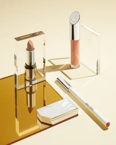 Still life image of cosmetics for Kjaer Weis by photographer Alpha Smoot, represented by Pat Bates & Associates, a premier photo and artist agency in the beauty retail sector.