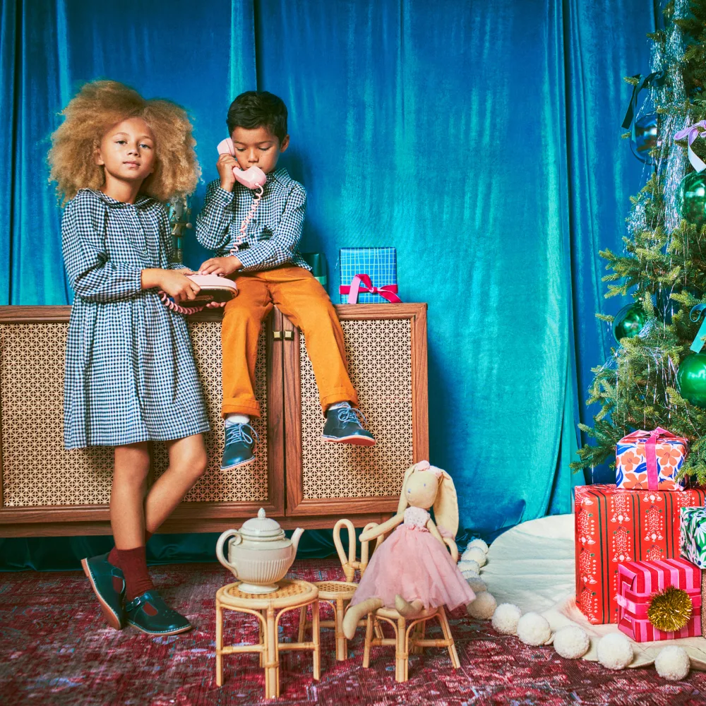 Lifestyle children's fashion still image for Maisonette with prop styling by Cecilia Elguero, represented by Pat Bates & Associates, a top photo agency for retail kids brand sectors.