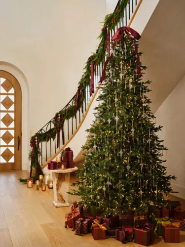 Interior still image of decorated holiday tree for Joss & Main with prop styling by Elizabeth MacLennan, represented by Pat Bates & Associates, a leading artist agency in the retail home sector.