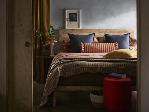 Interior still image of bedroom for Swoon with prop styling by Elkie Brown, represented by Pat Bates & Associates, a premier photo and artist agency in the retail home brand sector.
