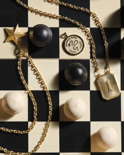 Still life of necklaces for Gem + Jewel’s seasonal catalog by photographer Janelle Jones, represented by Pat Bates & Associates, a leading photography agency in the fashion accessories and jewelry sectors.