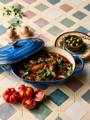 Still life image of blue Le Creuset cookware for Williams Sonoma Home by photographer Lennart Weibull, represented by Pat Bates & Associates, a leading artist management and photo agency in the interiors and retail home brand sectors.