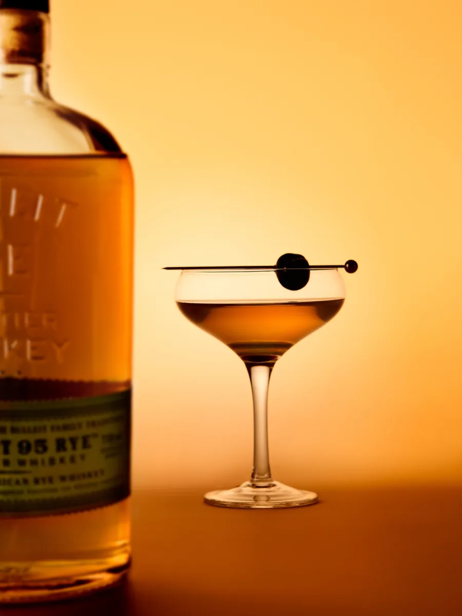 Still image of manhattan cocktail for BULLEIT Organic whisky with drink styling by Liberty Fennell for BULLEIT Organic whisky, represented by Pat Bates & Associates, a premier photo and artist agency in the food and beverage sectors.