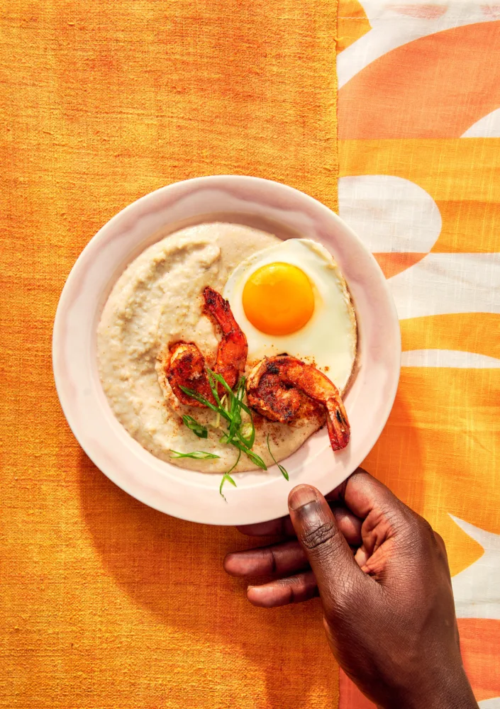 Chef Eric Adjepong's cookbook, Ghana to the World, with food and drink styling by Liberty Fennell, represented by Pat Bates & Associates, a top agency in the food and beverage sector.