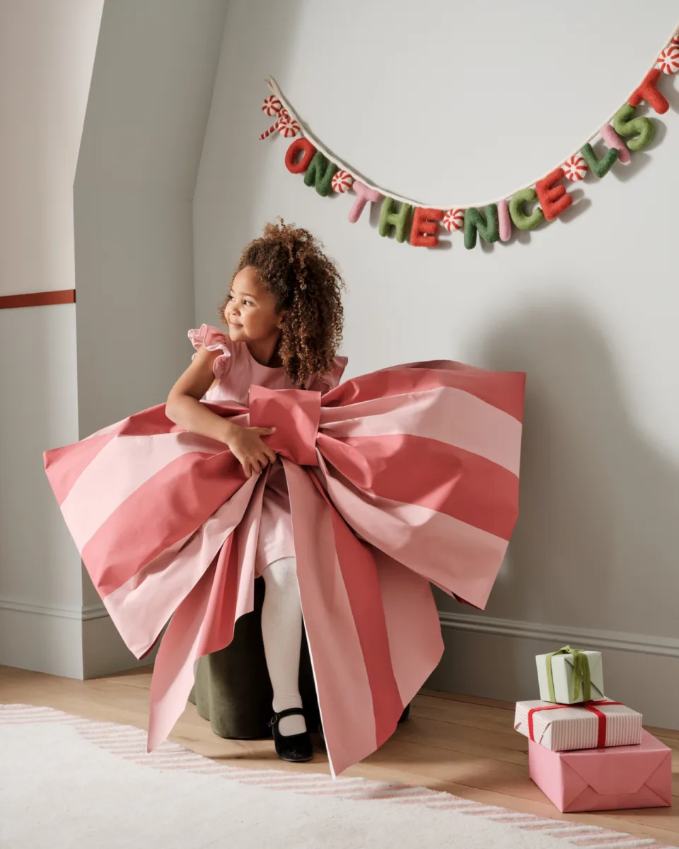 Lifestyle holiday decor still image for West Elm Kids with prop and wardrobe styling by Naomi deManana, represented by Pat Bates & Associates, a premier artist agency in the retail home sector.