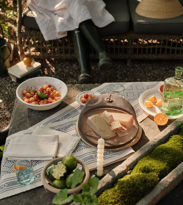 Still of alfresco lifestyle image with prop styling by Oliver Cano, represented by Pat Bates & Associates, a top photo agency in the food and beverage editorial, lifestyle and retail brand sectors.