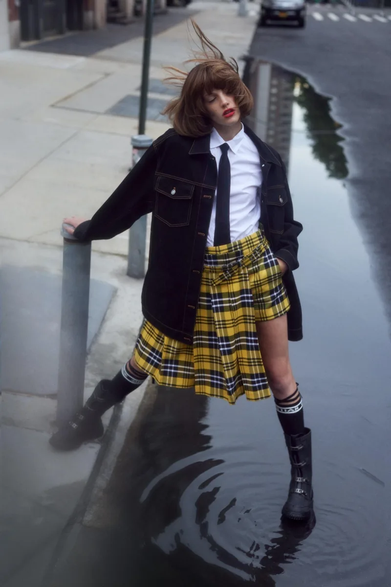 Lifestyle fashion still image of woman on street for The Gloss Magazine with hair and makeup up by hmu artist Paul Fields, represented by Pat Bates & Associates, a premier photo and artist agency in the editorial and lifestyle fashion sectors.
