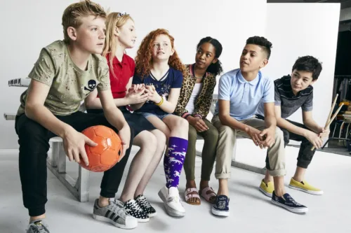 Lifestyle fashion still of pre-teen kids for Macy's with hair and makeup by hmy artist Paul Fields, represented by Pat Bates & Associates, a premier agency in the kids and lifestyle fashion sectors.