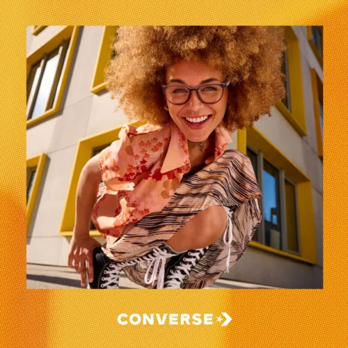 Lifestyle fashion still image of young adult woman for Converse Eyewear with hair and makeup by hmu artist Paul Fields, represented by Pat Bates & Associates, a leading photo agency in the lifestyle fashion and accessories retail advertising sectors.