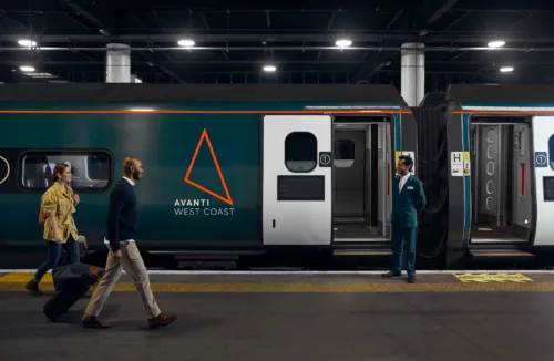 Lifestyle image for Avanti Trains of business men and women approaching a modern commuter train. Director & Photographer Toby Mitchell represented by Pat Bates & Associates, a top agency in the commercial photography sector.