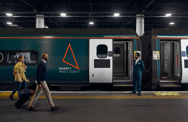 Lifestyle image for Avanti Trains of business men and women approaching a modern commuter train. Director & Photographer Toby Mitchell represented by Pat Bates & Associates, a top agency in the commercial photography sector.