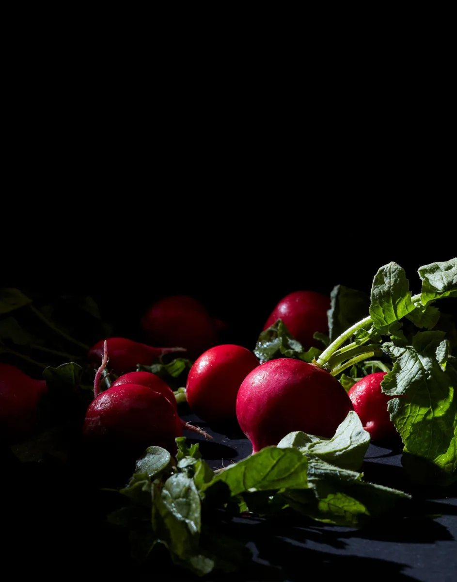 Still image of radishes for personal project by photographer Yunhee Kim, represented by Pat Bates & Associates, a premier photo and artist agency in the editorial and food and beverage brand sectors.