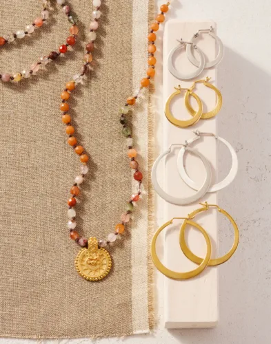 Still life image of seasonal jewelry for Garnet Hill by photographer Yunhee Kim, represented by Pat Bates & Associates, a leading photo agency in the lifestyle fashion sector.